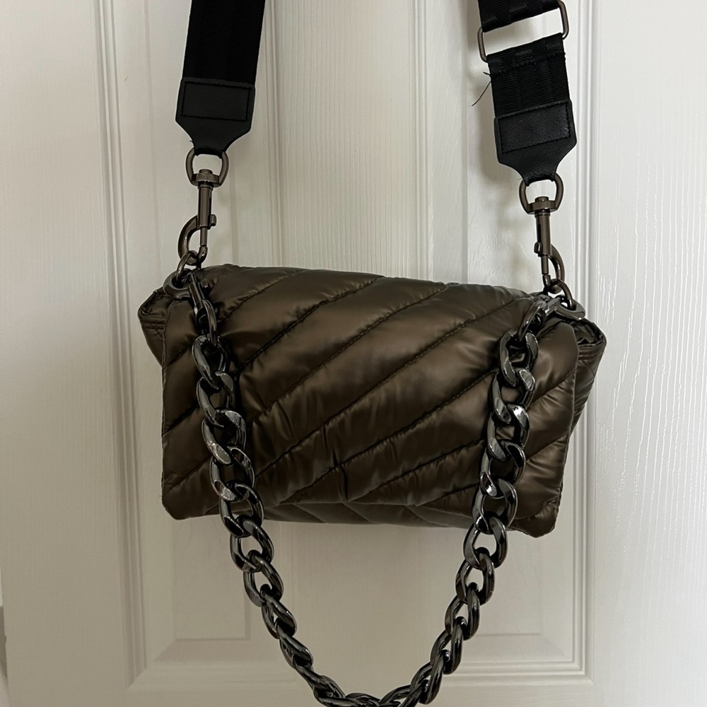 Think Rolyn flap bag!  Beautiful